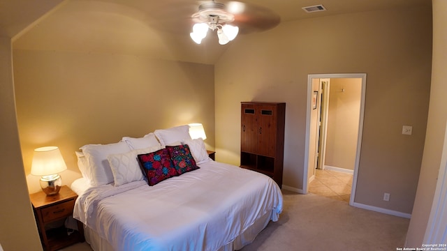 carpeted bedroom with lofted ceiling and ceiling fan