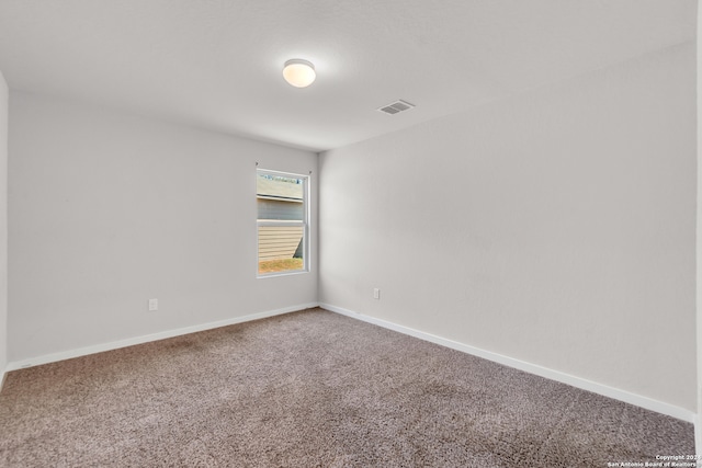 empty room featuring carpet