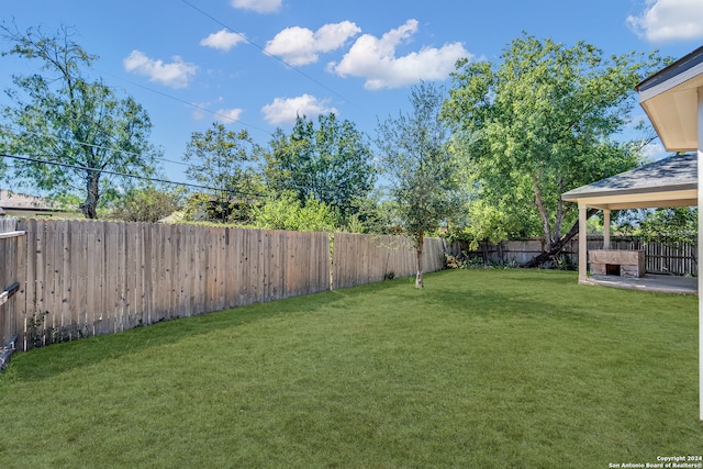 view of yard with a patio and a gazebo