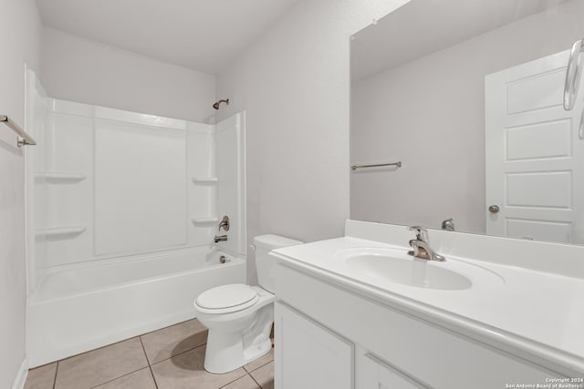 full bathroom with vanity, bathing tub / shower combination, toilet, and tile patterned floors