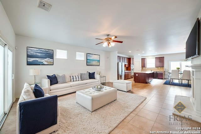 3718 Willow Walk, San Antonio, TX 78259 - living area with light tile patterned floors, a ceiling fan, and recessed lighting
