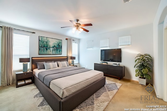 3718 Willow Walk, San Antonio, TX 78259 - bedroom with light carpet, a ceiling fan, and baseboards