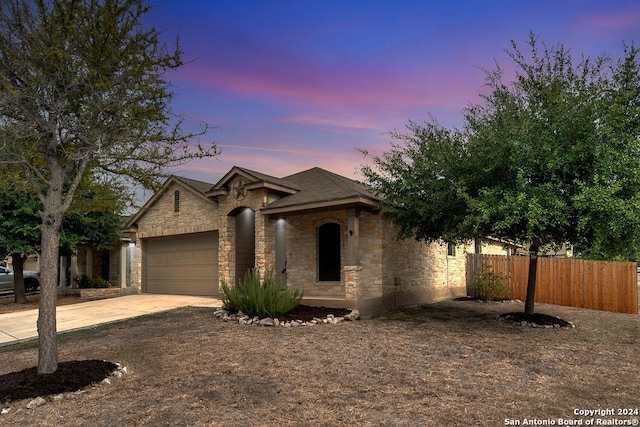 view of front of home with a garage