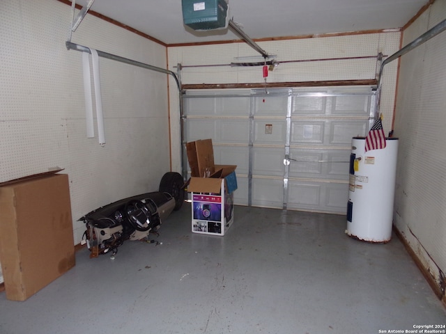 garage featuring a garage door opener and electric water heater