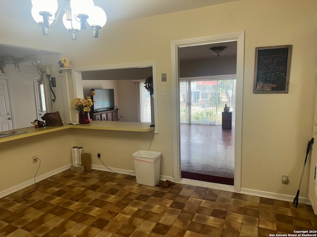 kitchen featuring an inviting chandelier