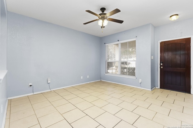 foyer entrance featuring ceiling fan