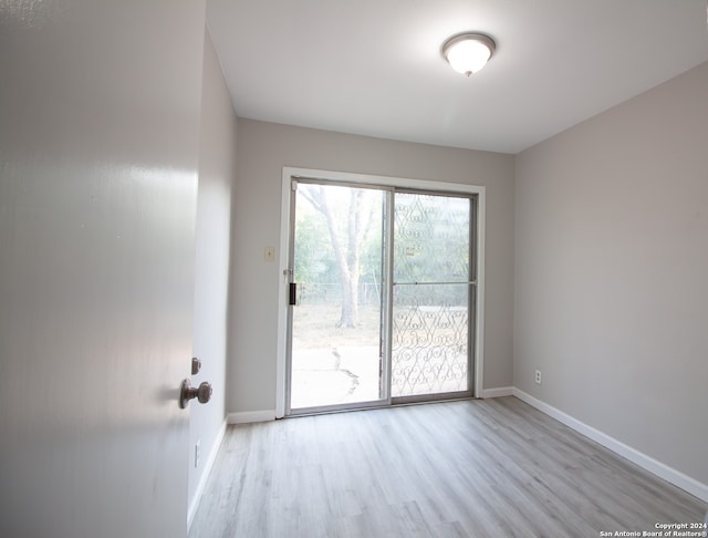 empty room featuring light hardwood / wood-style floors