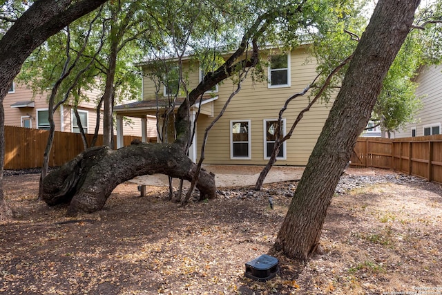 10707 Axis Xing, San Antonio, TX 78245 - rear view of property featuring a fenced backyard