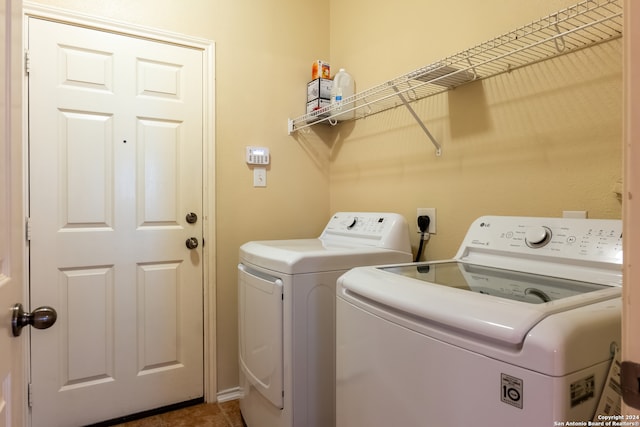 laundry area featuring independent washer and dryer