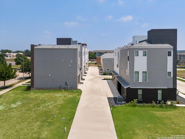 7942 Kennedy Hl Unit 8, San Antonio, TX 78235 - view of street featuring sidewalks, street lighting, and a residential view