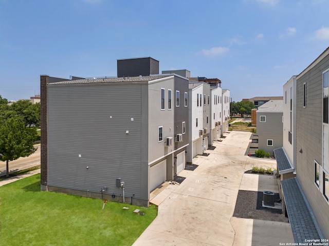 7942 Kennedy Hl Unit 8, San Antonio, TX 78235 - view of home's exterior featuring central AC and a residential view