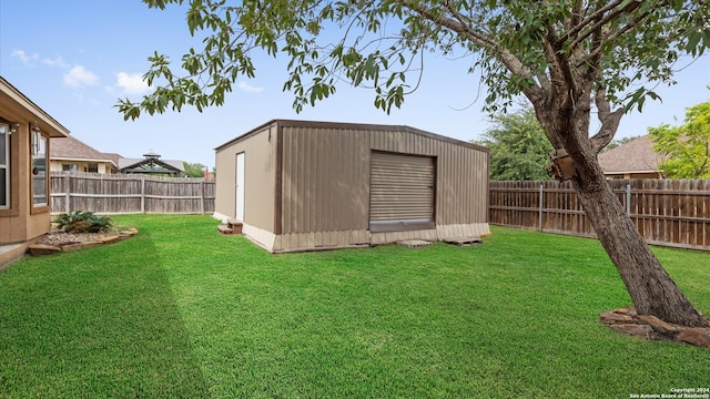 view of outbuilding with a lawn