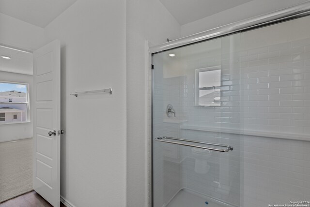 bathroom featuring walk in shower