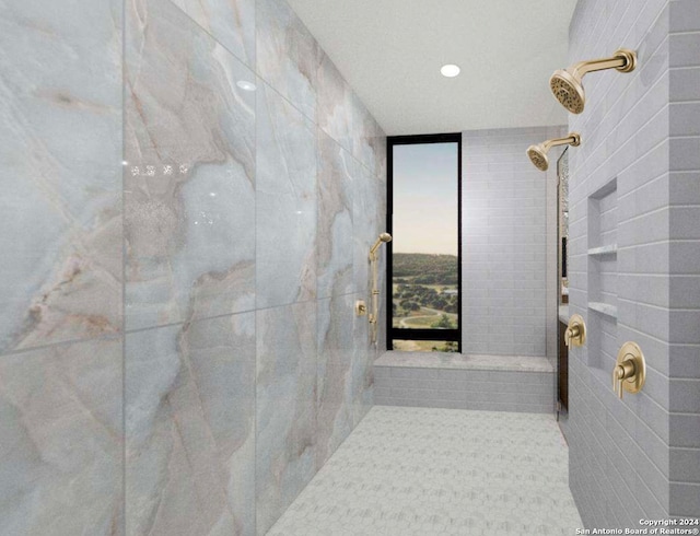 bathroom featuring tiled shower