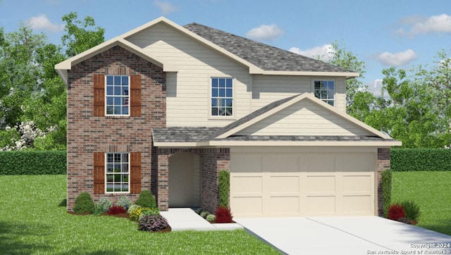 view of front of home with a front lawn and a garage