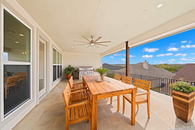 view of patio / terrace with ceiling fan and area for grilling