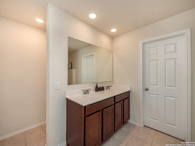 bathroom featuring vanity and tile patterned flooring