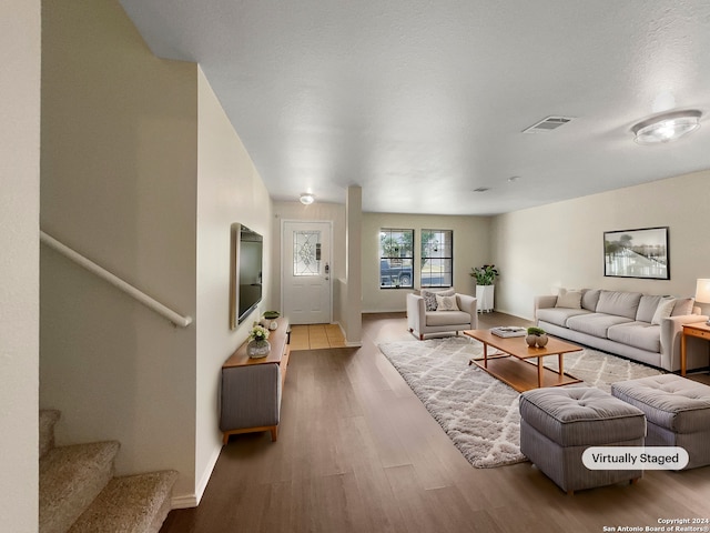 living room with hardwood / wood-style flooring