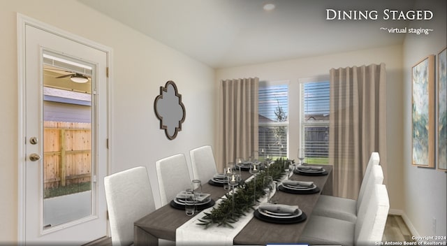 dining area with hardwood / wood-style floors