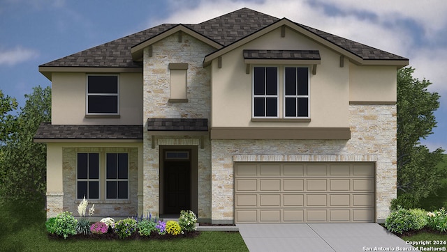 view of front of home with a garage