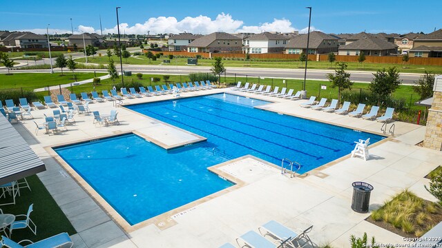 view of swimming pool featuring a patio area