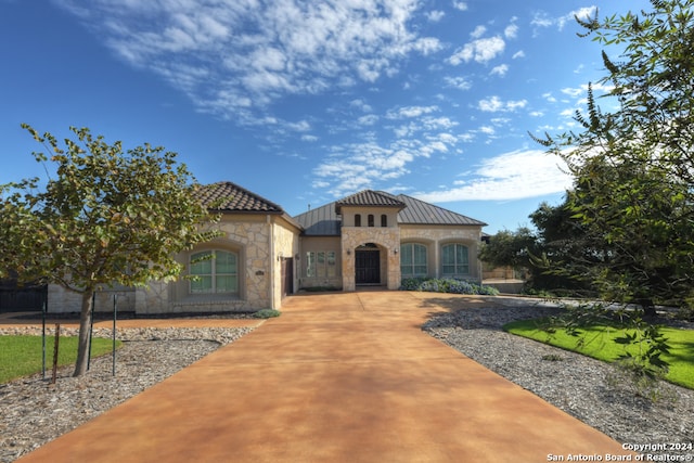 view of mediterranean / spanish-style house