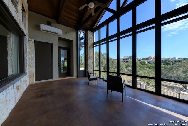 unfurnished sunroom featuring vaulted ceiling with beams, wood ceiling, a wall mounted air conditioner, and ceiling fan