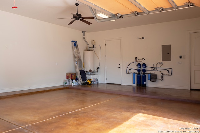 garage featuring electric panel, gas water heater, and ceiling fan