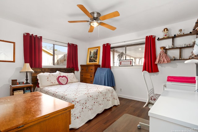 bedroom featuring dark hardwood / wood-style flooring and ceiling fan