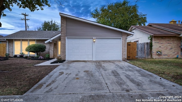 ranch-style home with a garage