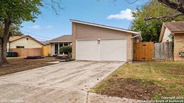 view of side of home featuring a garage