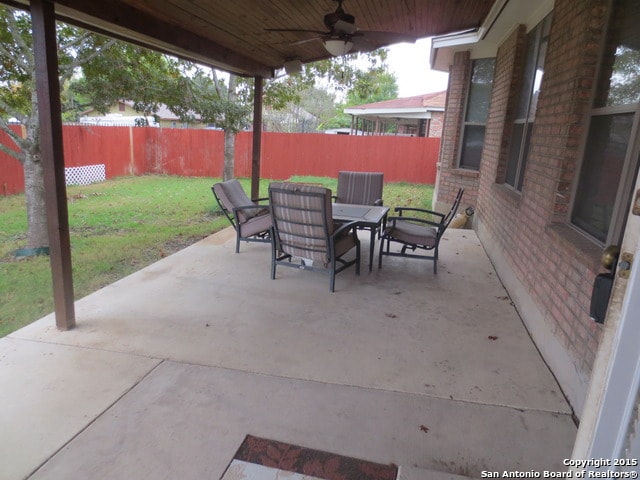 view of patio featuring ceiling fan