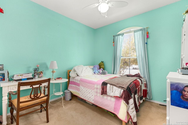 bedroom featuring light carpet and ceiling fan