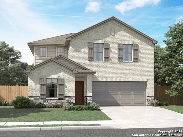 view of front of house with a garage and a front yard