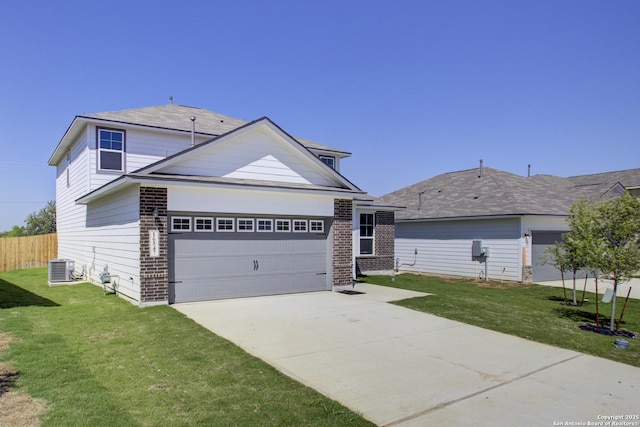 16547 Rosemary Rdg, San Antonio, TX 78112 - view of front of home with concrete driveway, a front yard, central AC, and brick siding