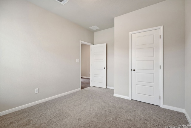 unfurnished bedroom with carpet