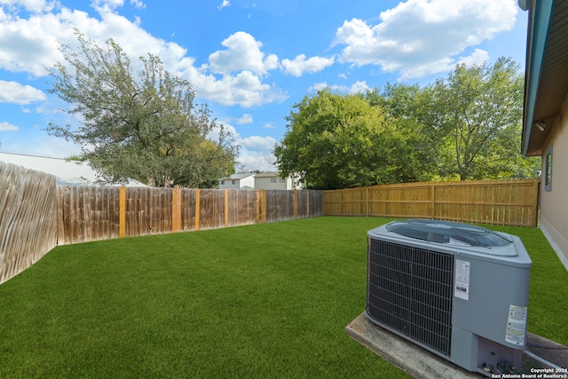 view of yard featuring central AC