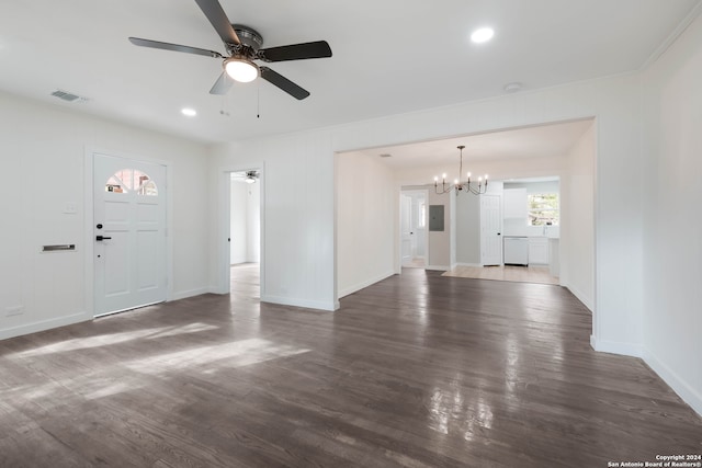 unfurnished living room featuring ceiling fan with notable chandelier, electric panel, and dark hardwood / wood-style floors