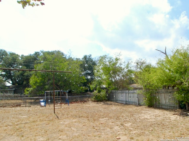 view of yard with a playground