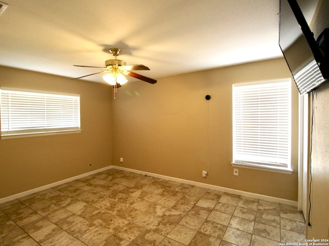 spare room featuring ceiling fan