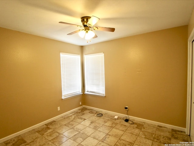 unfurnished room featuring ceiling fan