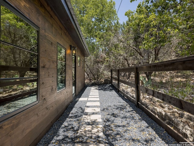 1941 Lakeshore Dr, Canyon Lake, TX 78133 - view of side of home with fence