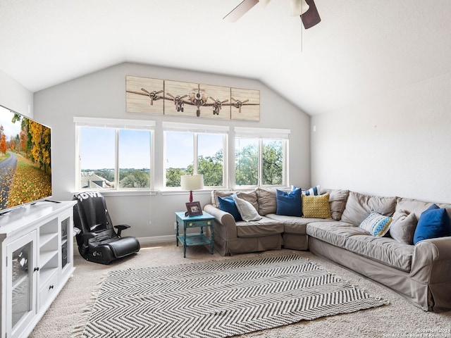 carpeted living room featuring lofted ceiling and ceiling fan