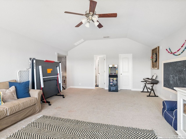 sitting room featuring lofted ceiling, light carpet, and ceiling fan