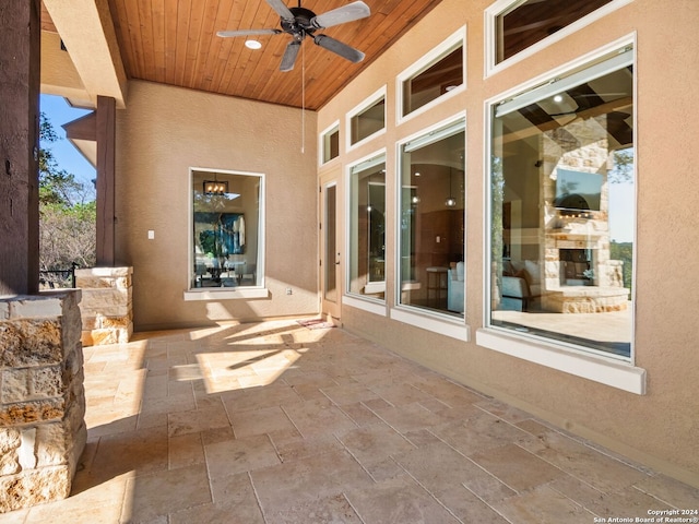 view of patio featuring ceiling fan