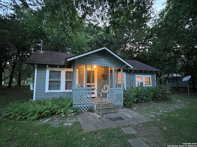 bungalow-style home featuring a porch