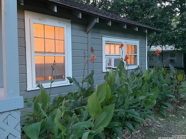 view of property exterior with cooling unit