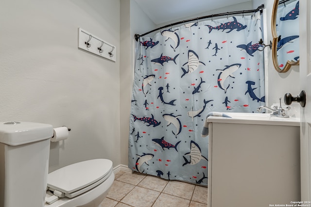 bathroom featuring a shower with curtain, tile patterned floors, vanity, and toilet