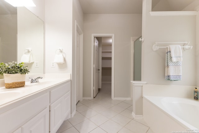 bathroom featuring vanity, tile patterned floors, and separate shower and tub