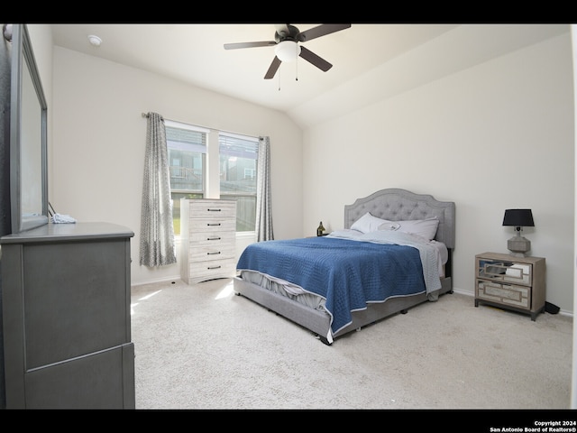 bedroom with lofted ceiling, carpet flooring, and ceiling fan